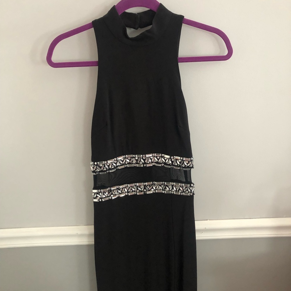 Black gown with slit and beaded and mesh detail